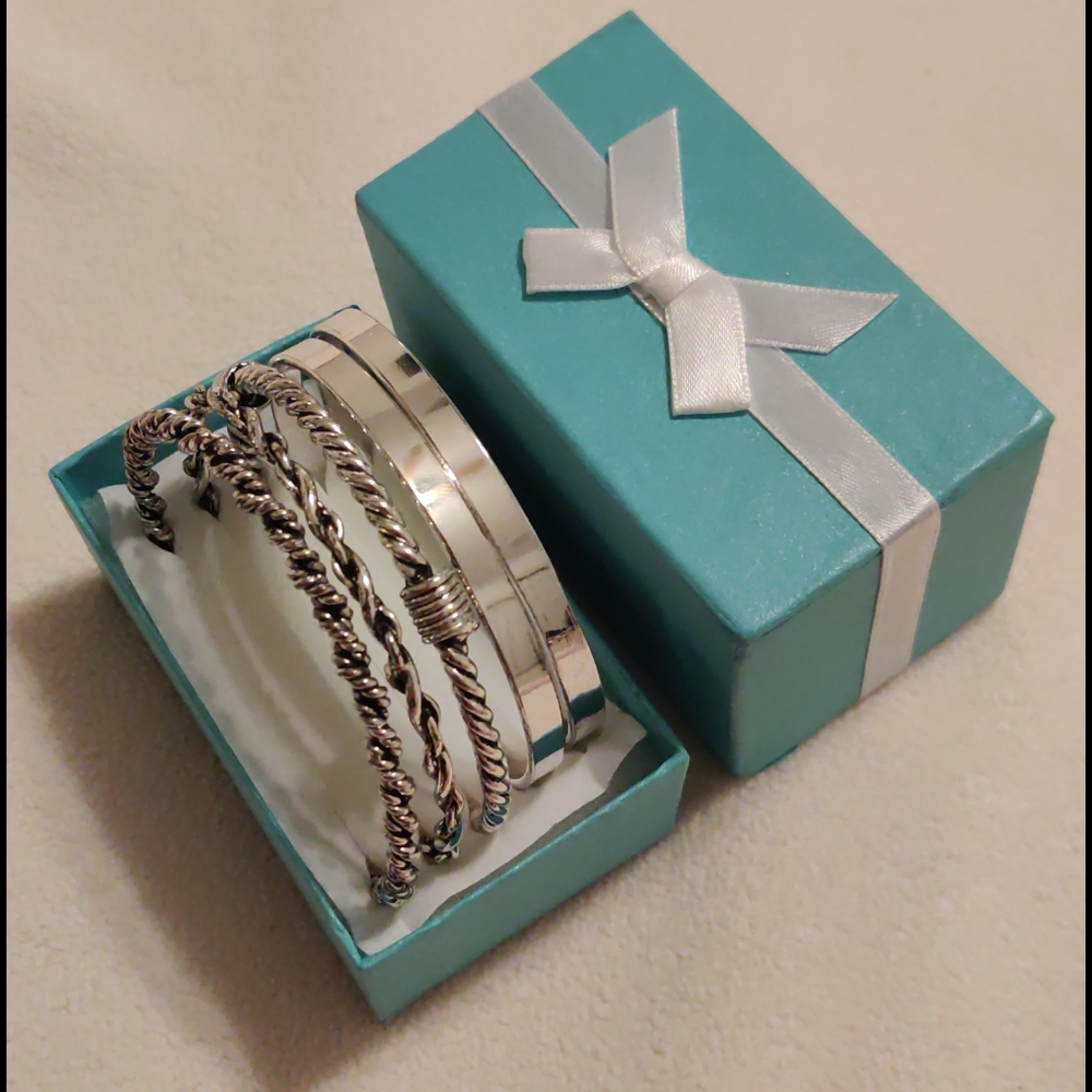 Set of 5 silver tone bangles